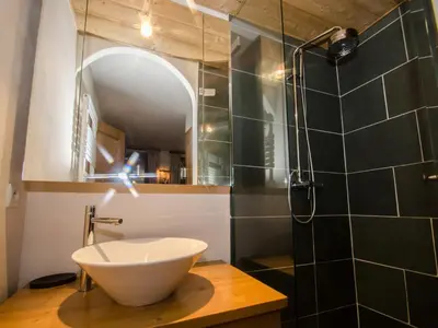 a bathroom with a sink and a shower at Appartement spacieux à Chamonix, 3 chambres, WiFi - FR-1-343-176 in Chamonix-Mont-Blanc