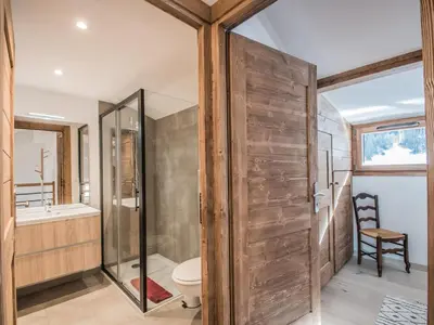 a bathroom with a shower and a toilet and a sink at Duplex 3 étoiles pour 6 pers, Chamonix, parking privé - FR-1-343-189 in Chamonix-Mont-Blanc