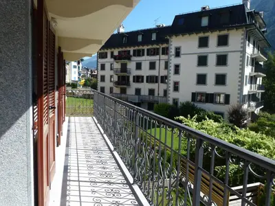 a balcony with a view of some buildings at Charmant appartement au cœur de Chamonix avec parking et animaux acceptés - FR-1-343-187 in Chamonix-Mont-Blanc