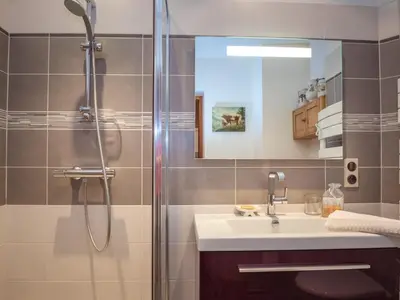 a bathroom with a shower and a sink at Superbe 4* Appartement de 3 Chambres au Cœur de Chamonix avec Wifi - FR-1-343-186 in Chamonix-Mont-Blanc