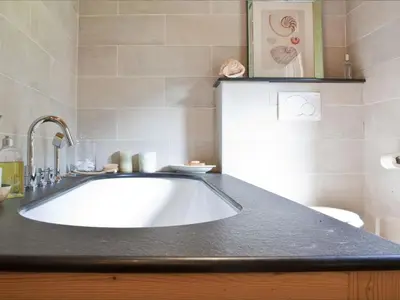 a bathroom with a large white bath tub at Superbe appartement avec cheminée à Argentière - FR-1-343-192 in Chamonix-Mont-Blanc