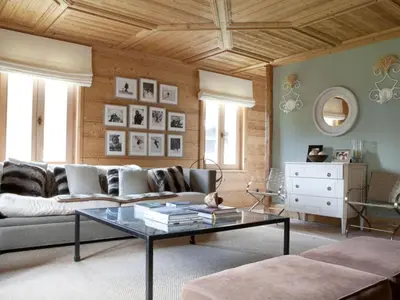a living room with a couch and a table at Superbe appartement avec cheminée à Argentière - FR-1-343-192 in Chamonix-Mont-Blanc