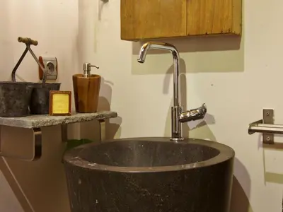 a sink in a bathroom with a faucet at Superbe appartement Chamonix pour 4, balcon, vue Mont Blanc - FR-1-343-209 in Chamonix-Mont-Blanc