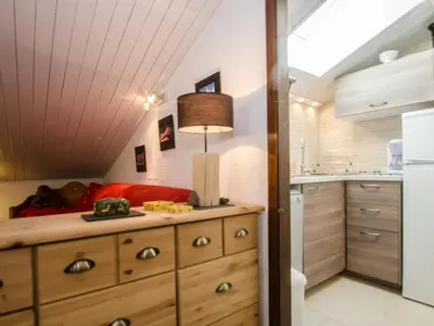 a kitchen with a dresser and a lamp on it at Bel appartement 4 pers avec parking et balcon à Chamonix - FR-1-343-214 in Chamonix-Mont-Blanc
