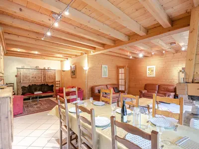 a dining room with a table and a fireplace at Chalet de charme à Chamonix avec WiFi et parking privé pour 12 pers. - FR-1-343-226 in Chamonix-Mont-Blanc