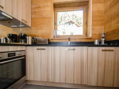 a kitchen with a sink and a window at Chalet mitoyen aux pieds des pistes pour 6 pers., animaux admis, à Chamonix - FR-1-343-225 in Chamonix-Mont-Blanc