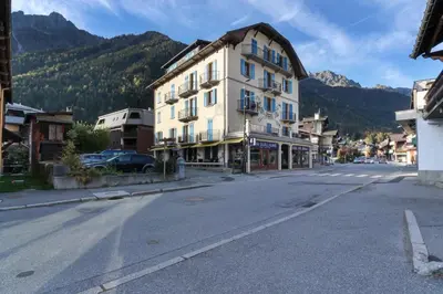 an empty street in a town in the mountains at Vallot - Chamonix Centre in Chamonix-Mont-Blanc