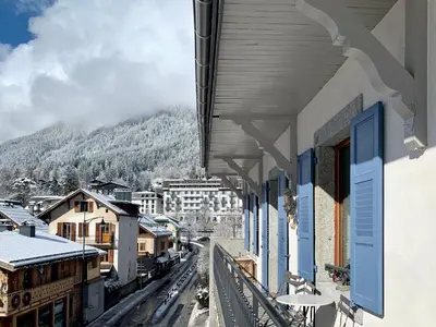 a train station with a view of a city at Chamonix Bellevue in Chamonix-Mont-Blanc