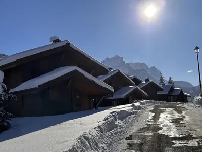 a row of houses covered in snow on a mountain at 4 pièces 6 pers : proche spa, ski bus, parking, WIFI - FR-1-572-119 in Arâches-la-Frasse