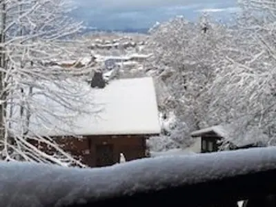 a snow covered roof of a house with a house at Appartement Rénové 6/8 Pers, Pied des Pistes, Balcon, Garage, WiFi - Arâches-la-Frasse - FR-1-572-139 in Arâches-la-Frasse