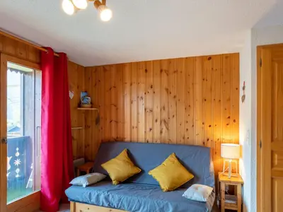a bedroom with two bunk beds and a window at Apartment Aiguilles du Midi by Interhome in Saint-Gervais-les-Bains