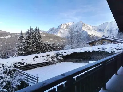 a villa with a swimming pool and a house at Holiday Home L'Adret by Interhome in Saint-Gervais-les-Bains