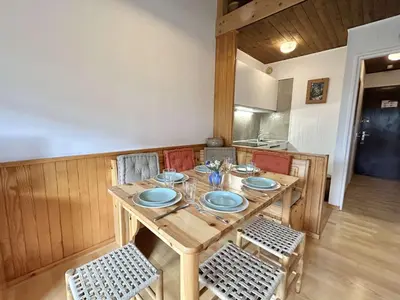 a wooden table with plates on it in a kitchen at Studio + Alcôve 4 Couchages, Balcon, Parking, Skis - Proche Rochebrune, Megève - FR-1-597-168 in Megève