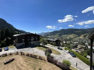 an aerial view of a house with a parking lot at Studio + Alcôve 4 Couchages, Balcon, Parking, Skis - Proche Rochebrune, Megève - FR-1-597-168 in Megève