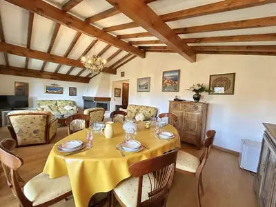 a dining room with a table and chairs at Charmant 2 pièces, 4 couchages, Megève - À 400m des remontées mécaniques, balcon et parking inclus - FR-1-597-169 in Megève