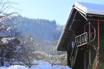 a snow covered cabin with a balcony in the snow at Grand Morillon- C215 Appt vue piste-4 pers in Morillon