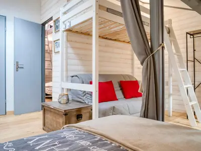 a dining room with wooden tables and chairs at Triplex chaleureux avec wifi - 6 personnes - Proche centre - FR-1-663-6 in Saint-Gervais-les-Bains