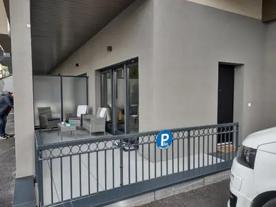 a parking meter on a balcony of a house at Roomy studio near town and ski lift, free WiFi and parking in Saint-Gervais-les-Bains