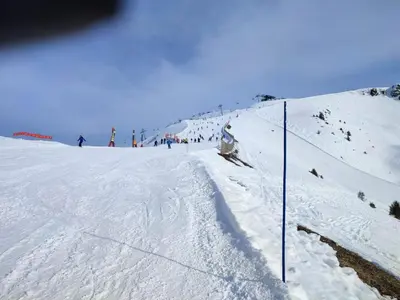 a group of people skiing down a snow covered slope at Coquet Studio de 4 personnes aux Carroz - Balcon et Wifi in Les Carroz d'Araches
