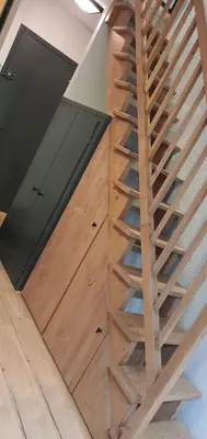 a wooden staircase next to a wooden door at Duplex Aiguille du midi CHAMONIX in Chamonix-Mont-Blanc