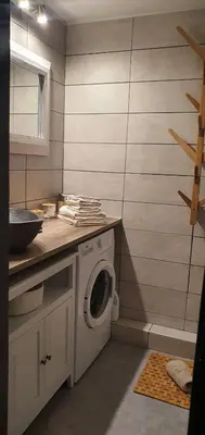 a laundry room with a washer and dryer at Duplex Aiguille du midi CHAMONIX in Chamonix-Mont-Blanc