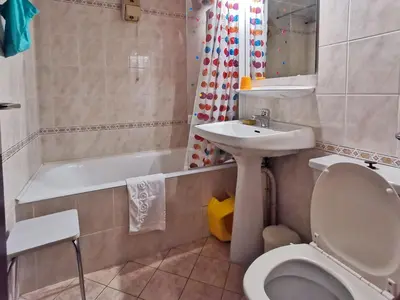 a bathroom with a toilet and a sink and a tub at Sun Valley 3 - Vue Mont-Blanc in Chamonix-Mont-Blanc