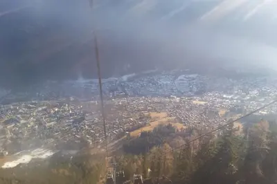 an aerial view of a city from an airplane at Three Bedroomed Chalet Apartment in Chamonix-Mont-Blanc