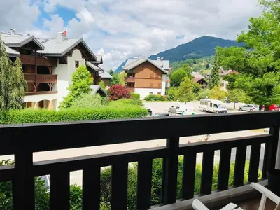 a balcony with a view of a town at Appartement 3 pièces, 6 pers., Samoëns, avec Wifi et Parking - FR-1-629-11 in Samoëns