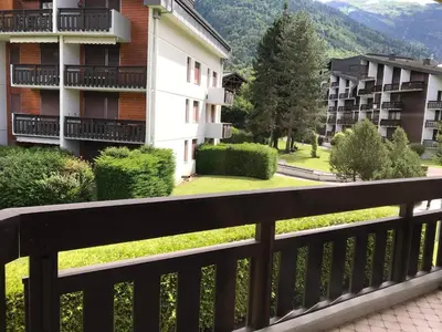 a view from a balcony of a apartment building at Appartement 3 pièces, 6 pers., Samoëns, avec Wifi et Parking - FR-1-629-11 in Samoëns