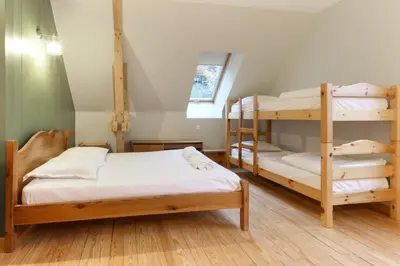 a bedroom with two bunk beds and a window at Saint Éloi - Panoramic view - Mont Joly - Central in Saint-Gervais-les-Bains