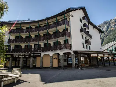 a large building with a balcony on the side of it at Studio 2* central avec balcon et WiFi - FR-1-343-235 in Chamonix-Mont-Blanc