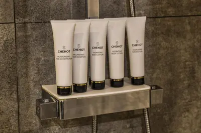 a group of white products on a shelf at Le petit cœur de Megève -Mont770- in Megève