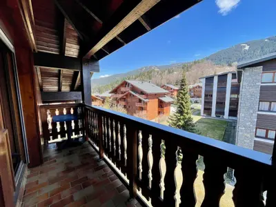 a balcony with a view of the mountains at T3 Appartement haute-Savoie Carroz in Les Carroz d'Araches