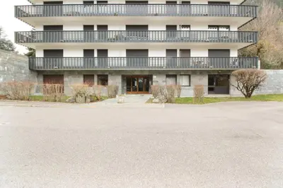 an empty parking lot in front of a building at Makalu - View Mont-Blanc - Chamonix Center -8 pers in Chamonix-Mont-Blanc