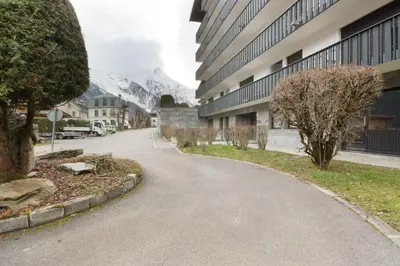 an empty street with a mountain in the background at Makalu - View Mont-Blanc - Chamonix Center -8 pers in Chamonix-Mont-Blanc