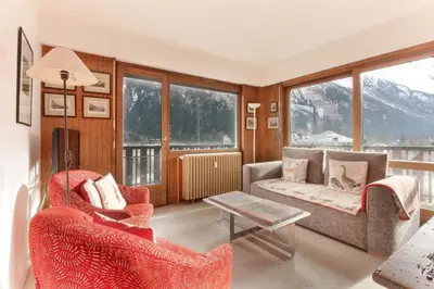 a living room with two chairs and a couch at Makalu - View Mont-Blanc - Chamonix Center -8 pers in Chamonix-Mont-Blanc