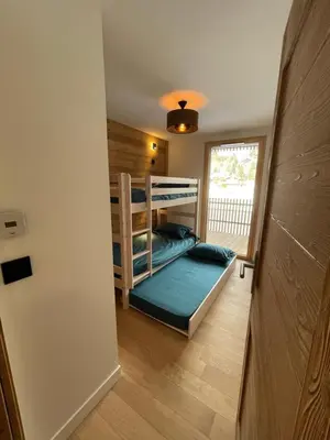 a bunk bed room with a bunk bed in a house at les Airelles 202 in Les Carroz d'Araches