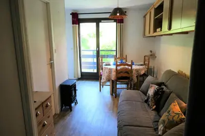 a living room with a couch and a table at Résidence Cristal - Cristal 161 MAE-5824 in Mémontel