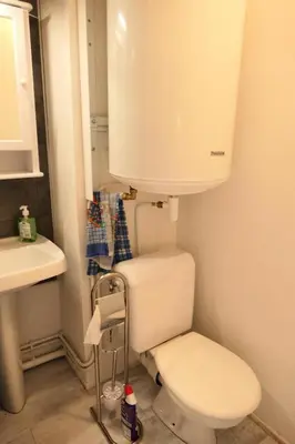 a bathroom with a white toilet and a sink at Résidence Cristal - Cristal 161 MAE-5824 in Mémontel