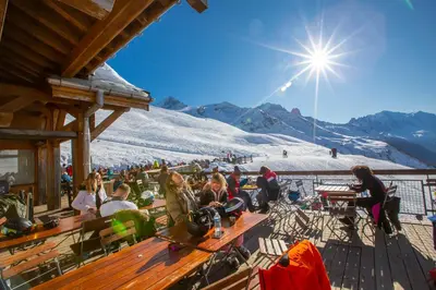 a ski lift in the mountains with people on it at Chamonix Sud - Bâtiment Iris 357 - Happy Rentals in Chamonix-Mont-Blanc