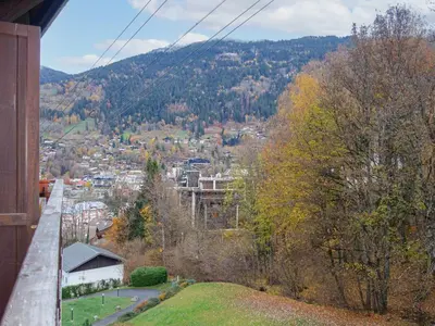 a view of the woods from the deck of a house at Studio La Piste B71 by Interhome in Saint-Gervais-les-Bains