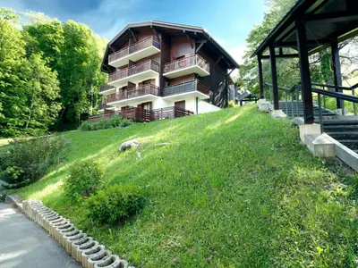 a large apartment building with balconies on a hill at Studio La Piste B71 by Interhome in Saint-Gervais-les-Bains