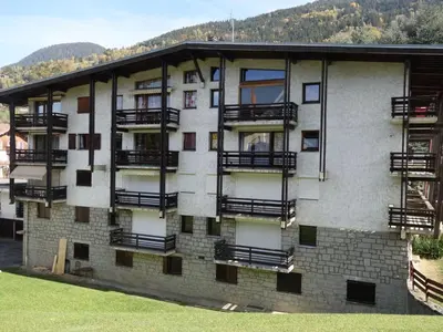 an apartment building with balconies on the side of it at Apartment Le Nerey-2 by Interhome in Saint-Gervais-les-Bains