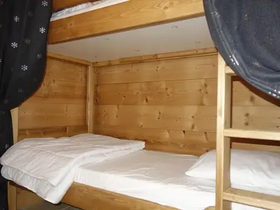 a bedroom with two bunk beds in a cabin at Apartment Le Domaine de Crespin by Interhome in Saint-Gervais-les-Bains