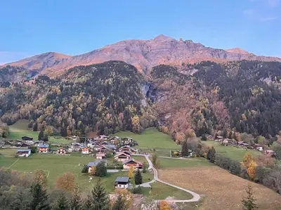 an aerial view of a village in the mountains at Cozy studio au centre du village & superbe vue in Les Contamines-Montjoie