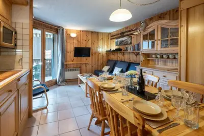 a dining room with a long table and chairs at Apartment Husky in Saint-Gervais-les-Bains