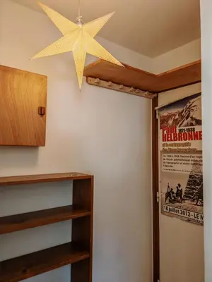 a desk with a chair in a room at Beau duplex lumineux à la montagne Nice flat just underneath MtBlanc in Les Houches