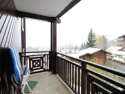 a screened porch with a view of a snow covered yard at Studio spacieux 4 pers : parking, lave-vaisselle, proche télécabine - FR-1-572-108 in Arâches-la-Frasse