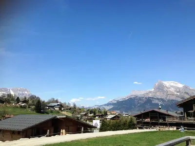 a view of a town with mountains in the background at Résidence Mazot De La Princesse - Chalet de la Princesse MAE-0864 in Megève