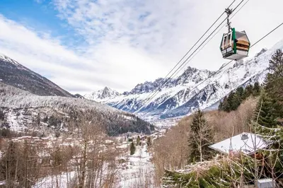 a gondola ride in the mountains with snow at Chalet Kieppi - View off Mont-Blanc range in Les Houches